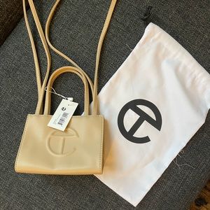 Telfar small shopping bag in cream